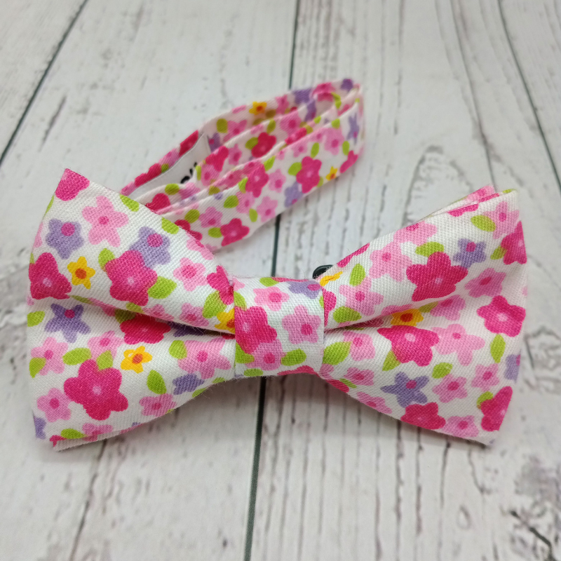 Nœud papillon motifs tons rose enfant